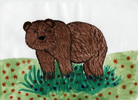 Медведь на поляне с земляникой